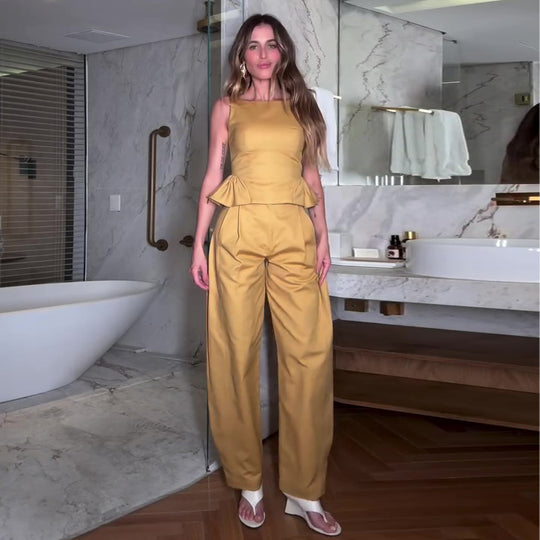 Damen Elegantes Jumpsuit mit peplum Detail und weitem Bein EB