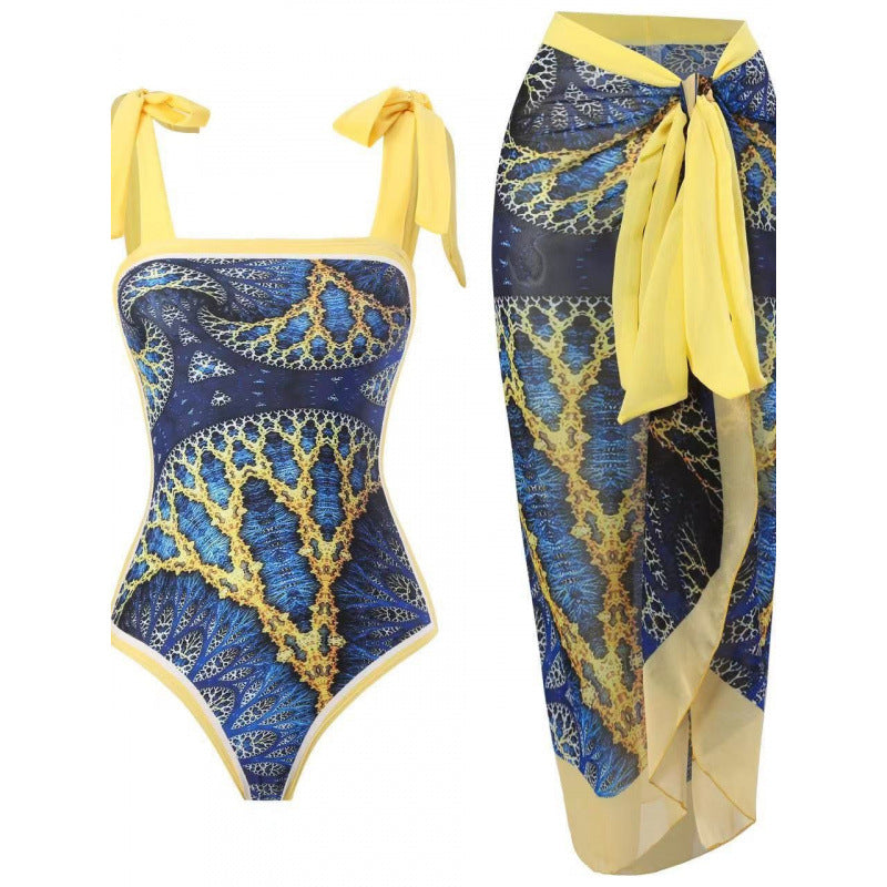 Damen Einteiliger Badeanzug mit stilvollem Wickelrock und modischem Muster EB