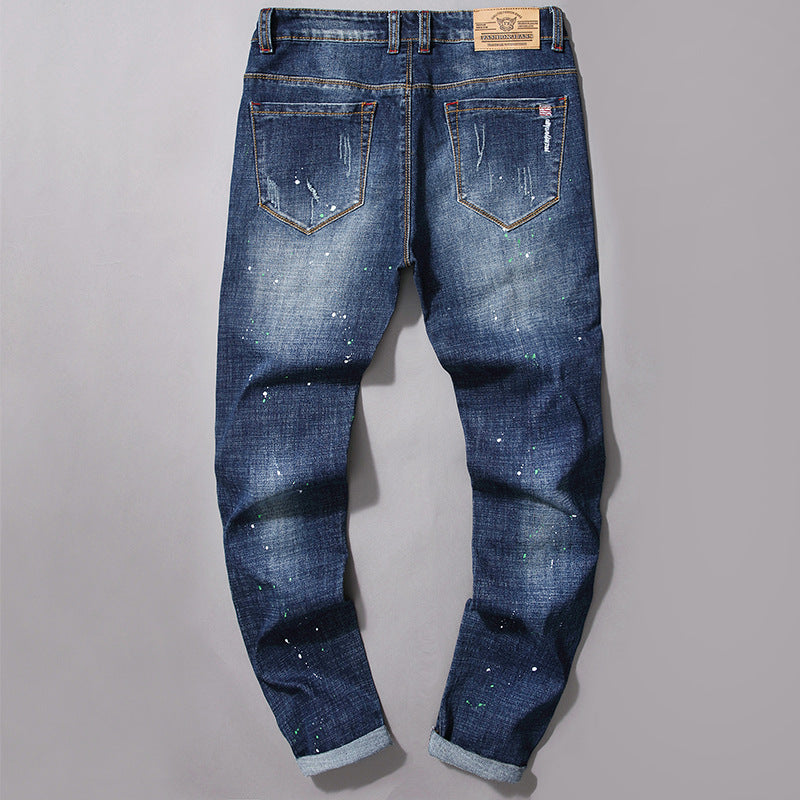 Herren modische Jeans mit kreativen Farbklecksen und Rissdesign EB