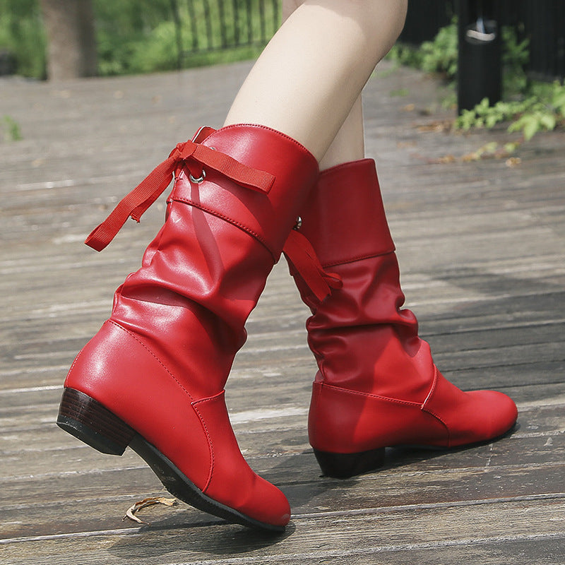 Damen hohe Stiefeletten mit modischem Schlupfdesign und verspieltem Riemchen EB