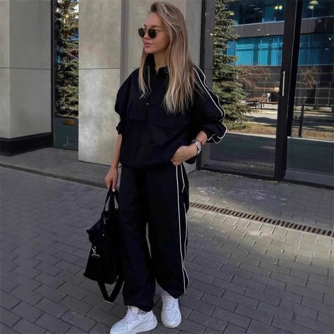 Damen leichtes Half-Zip Windbreaker-Oberteil mit Kängurutasche, elastischen Bündchen und seitlicher Paspel Eichborn Berlin