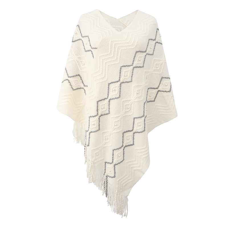 Damen eleganter Poncho mit auffälligem Strukturmuster und dekorativen Fransen EB
