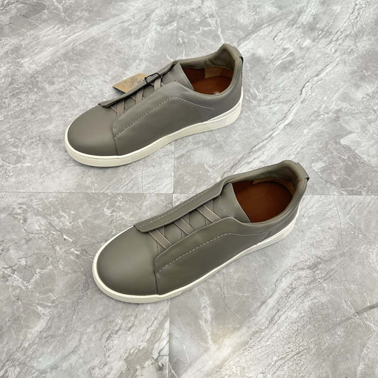 Damen Slip-On Sneakers mit eleganter Lederstruktur und rutschfester Sohle EB