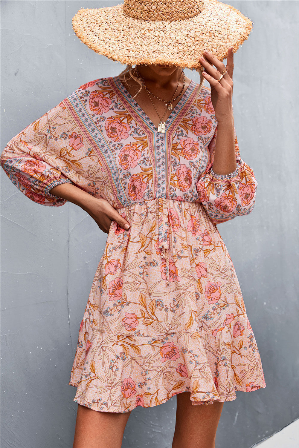 Damen Sommerliches Blusenkleid mit auffälligem floralen Muster und eleganten Puffärmeln EB