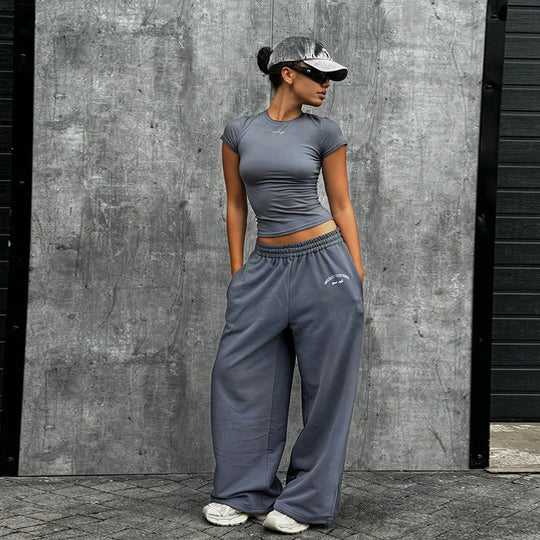 Damen Sportliches Set mit Figurbetontem Oberteil und weitem Hosen EB