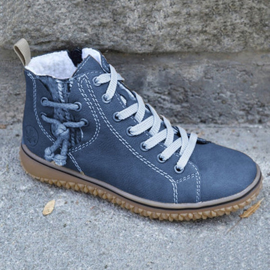 Damen High-Top Sneaker-Boot mit seitlichem Reißverschluss, dekorativem Knöchelriemen und profilierter Gummisohle EB