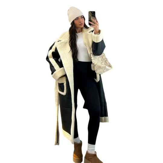 Damen Oversized Kunstfelljacke mit Taschen und elegantem Schnitt EB