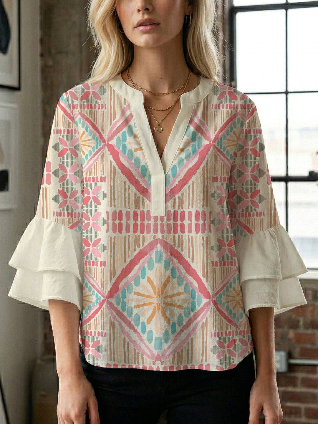 Damen Bluse mit voluminösen Rüschenärmeln und modernem Motiv EB