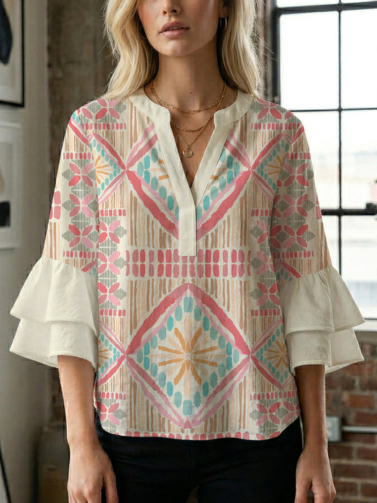 Damen Bluse mit voluminösen Rüschenärmeln und modernem Motiv EB