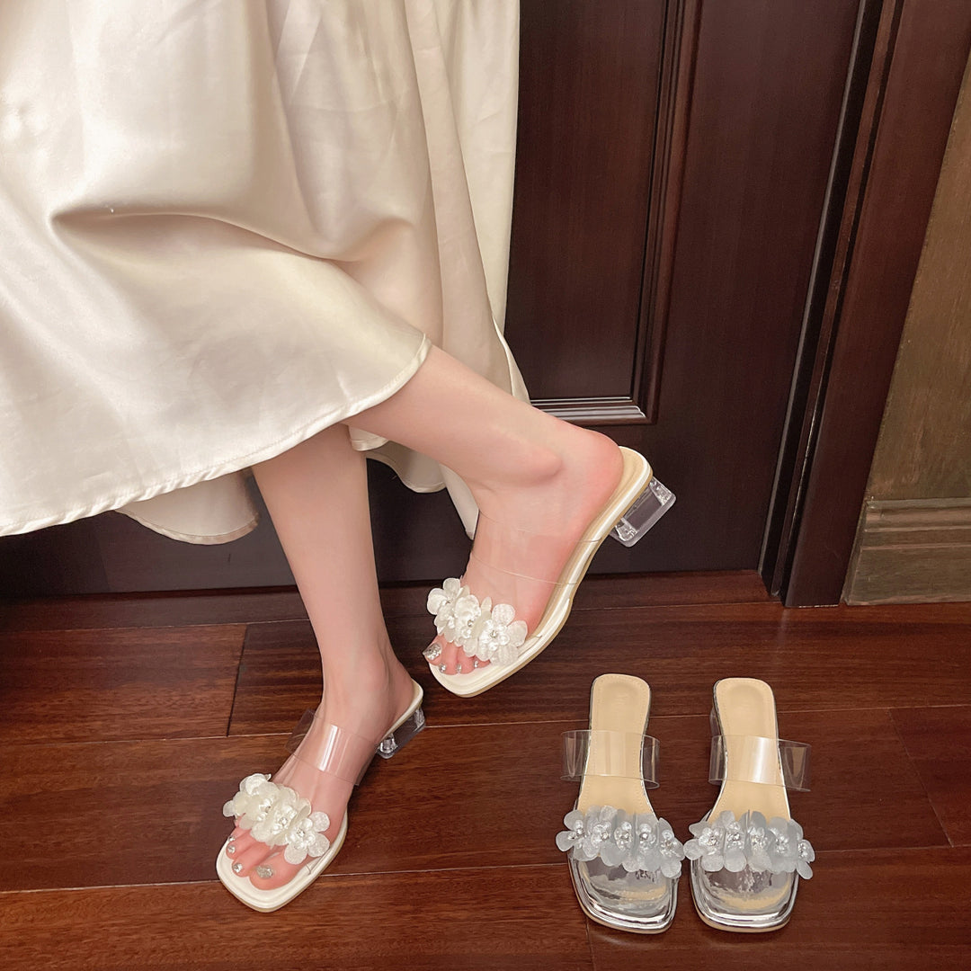 Damen Offene Mules mit floralen Applikationen und transparentem Absatz EB