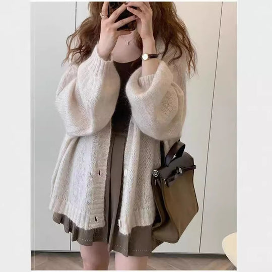 Damen Strickjacke im lässigen Oversized-Stil mit voluminösen Ärmeln und praktischen Taschen EB