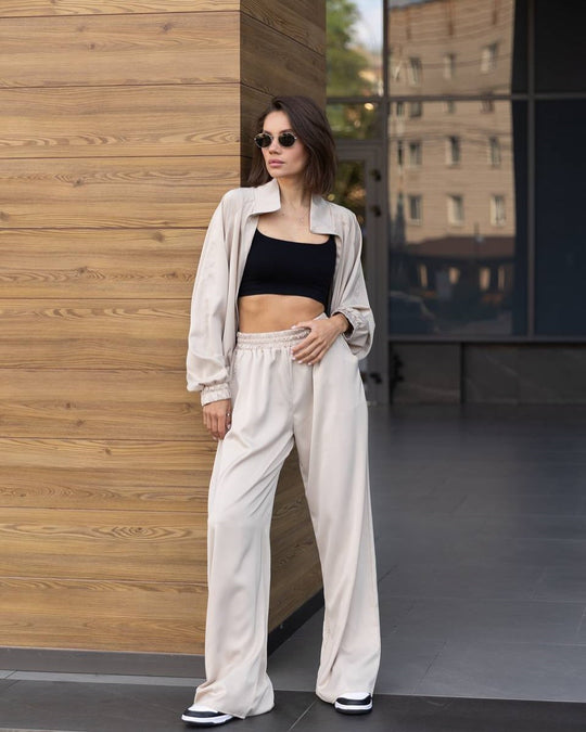 Damen lässiges Zweiteiler Set aus fließender Satinoptik mit weitem Bund und Crop-Top Eichborn Berlin
