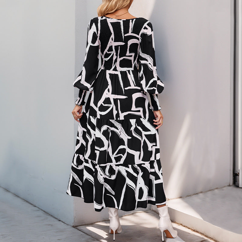 Damen Maxikleid mit modernen grafischen Mustern und voluminösen Ärmeln EB