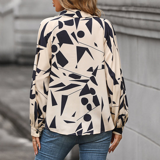 Damen Bluse mit elegantem geometrischen Design und Puffärmeln EB