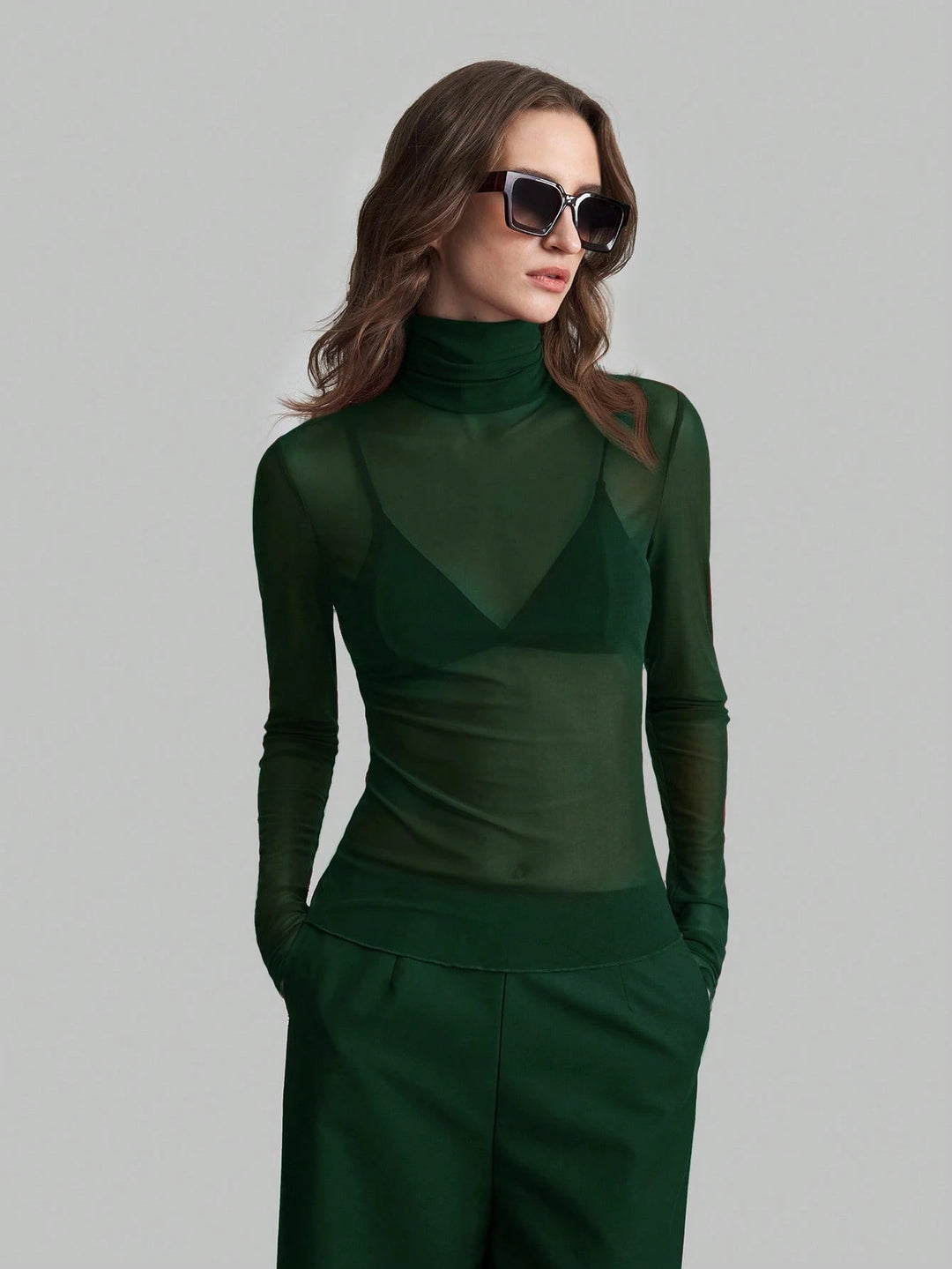 Damen Transparente Turtleneck-Bluse mit figurformendem Schnitt EB