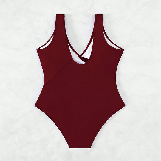 Damen Einteiler Badeanzug mit elegantem Wickeldesign und raffinierten Ziernieten EB
