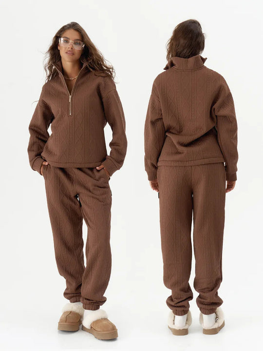 Damen Zopfstrick-Lounge-Set mit halbem Reißverschluss und hochtaillierter Jogginghose Eichborn Berlin