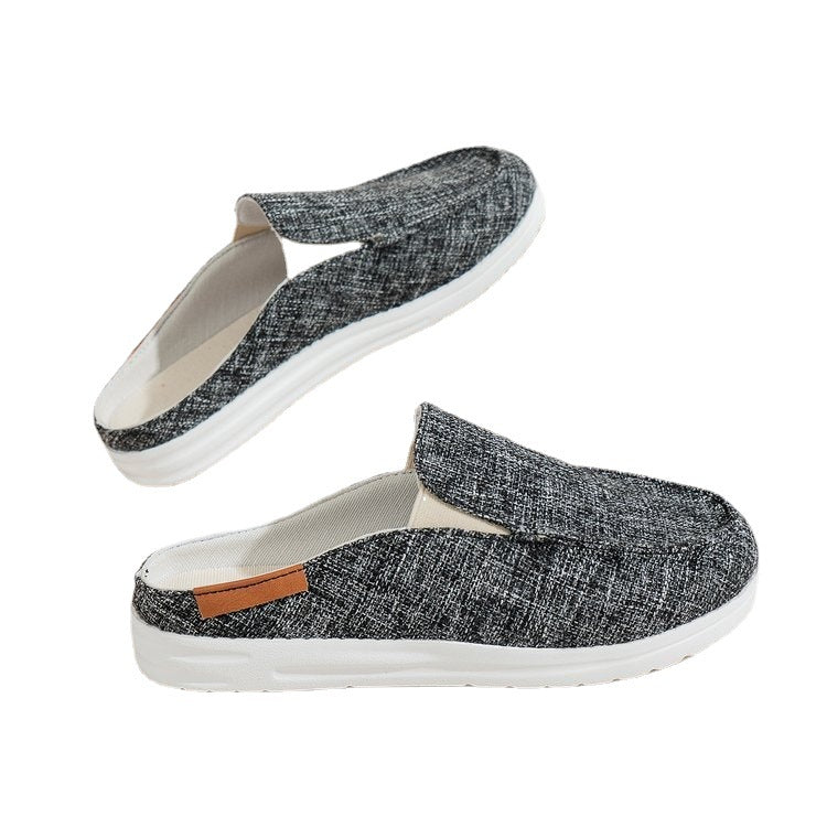 Damen  Slip-On Canvas‑Mules mit Kuhfleckenprint, gepolstertem Komfortfußbett und rutschfester Leichtsohle EB