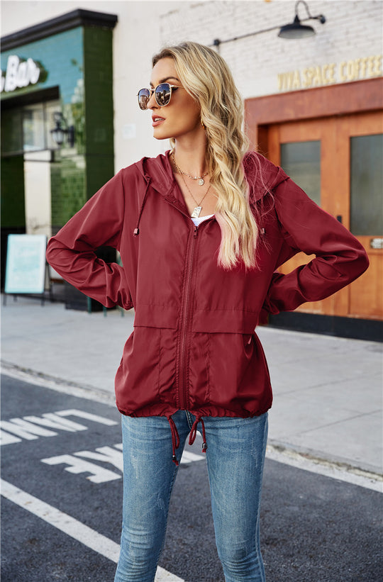 Damen leichte und atmungsaktive Windbreaker-Jacke mit verstellbarem Kapuzenkragen EB