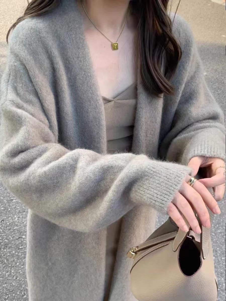 Damen Gemütliche Strickjacke mit oversized Schnitt und sanften Puffärmeln EB
