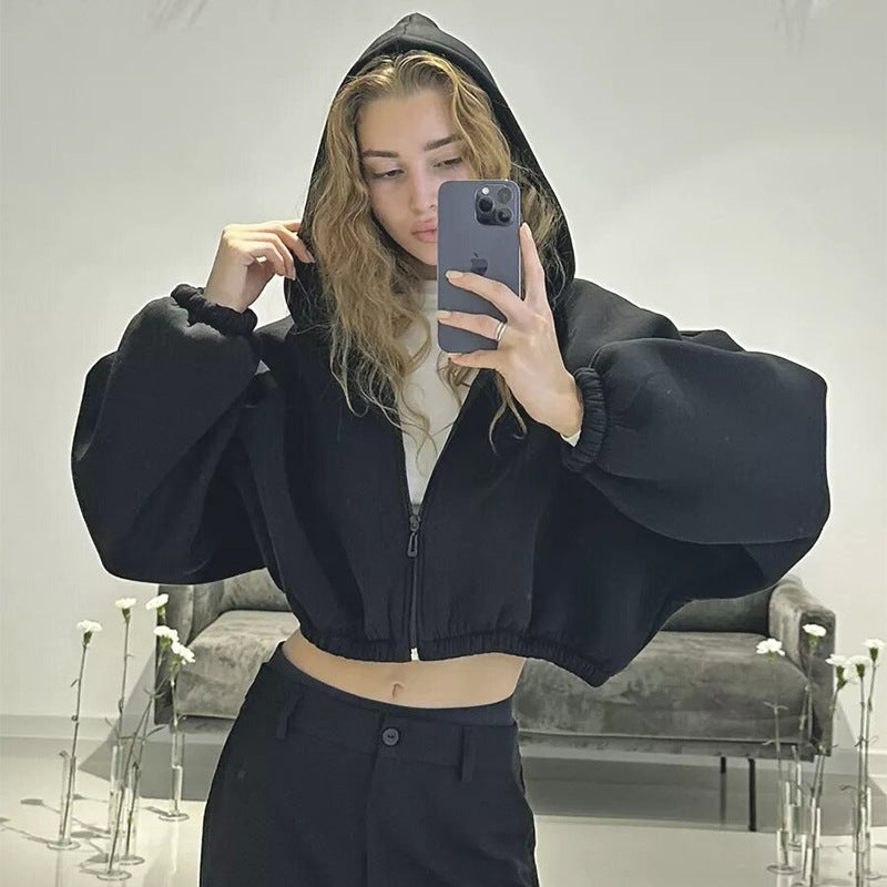 Damen kurzes Oversize-Kapuzen-Sweatshirt mit Reißverschluss, Ballonärmeln und elastischem Saum EB