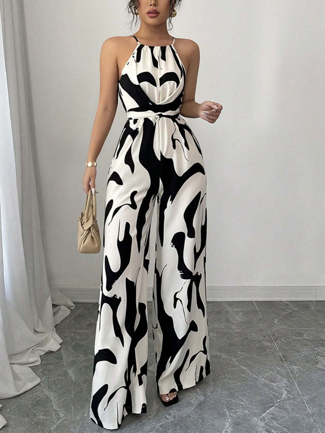 Damen Modischer Jumpsuit mit Spaghettiträgern und weitem Bein EB