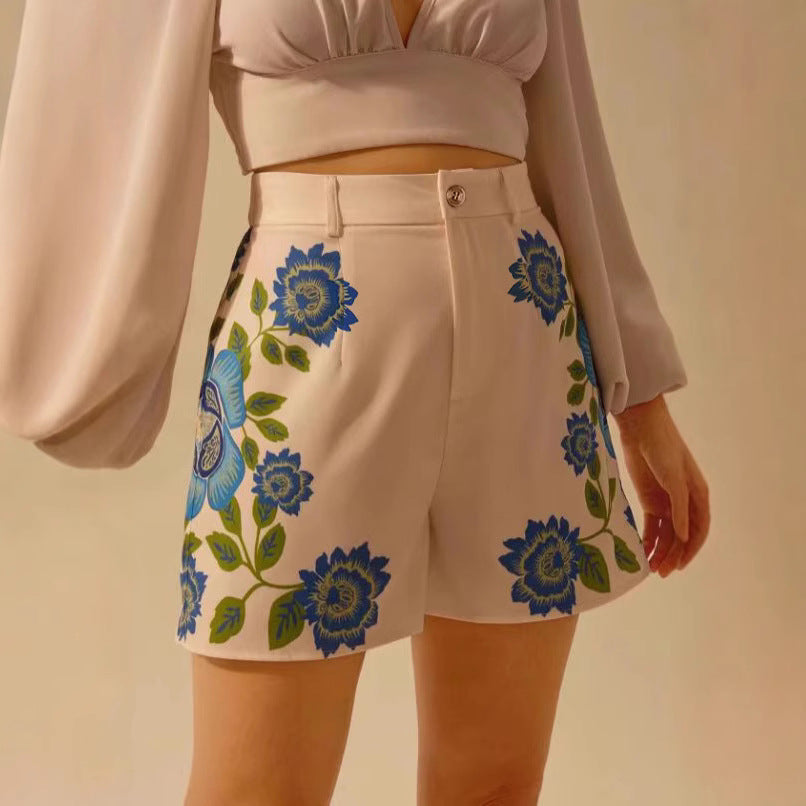 Damen Shorts mit floralem Druck und dekorativen Details EB