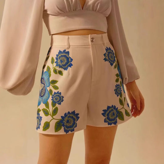 Damen Shorts mit floralem Druck und dekorativen Details EB