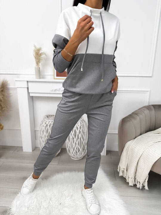 Damen Zweiteiliges Loungewear‑Set mit Stehkragen, Kängurutasche und schmaler Jogginghose EB