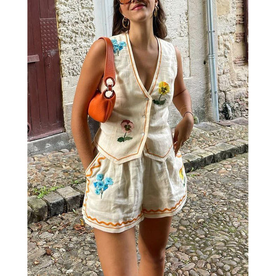 Damen Set aus ärmellosem Blusenkleid und Shorts mit floralem Design EB