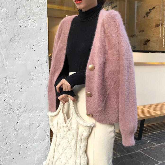 Damen Kuschelige Strickjacke mit Knopfdetails und weit geschnittenem Design EB
