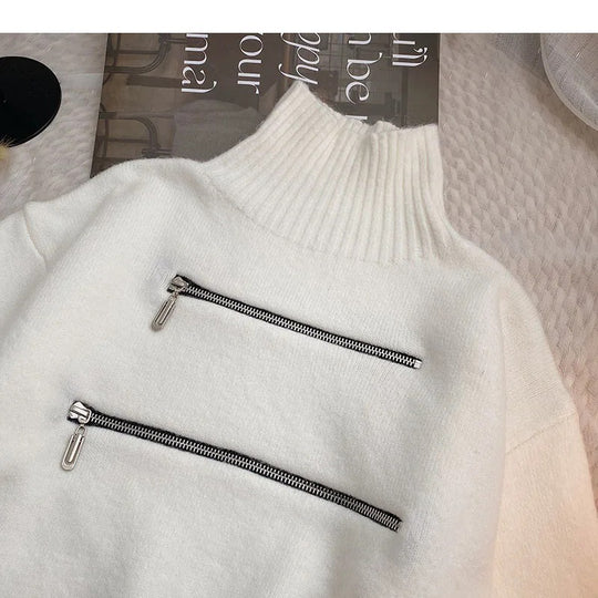 Damen stylischer Stehkragenpullover mit zwei asymmetrischen Reißverschlusstaschen und fransigem Saum EB