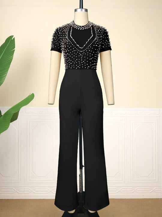 Damen eleganter Jumpsuit mit glitzernden Perlenakzenten EB