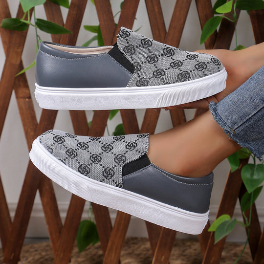 Damen Freizeit-Slipper mit modischem Logo-Design und elastischen Einsätzen EB