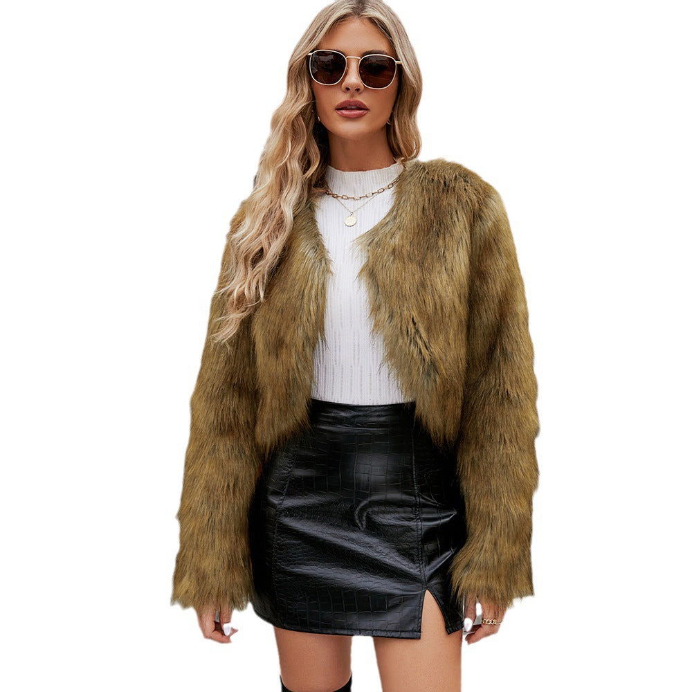 Damen Kunstfelljacke mit voluminösen Ärmeln und elegantem Schnitt EB