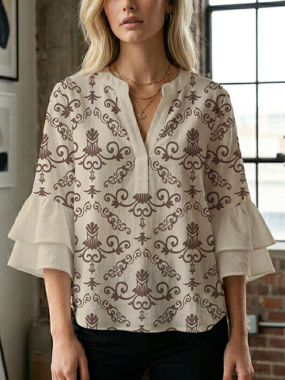 Damen Blusenshirt mit voluminösen Ärmeln und kreativem Druckdesign EB