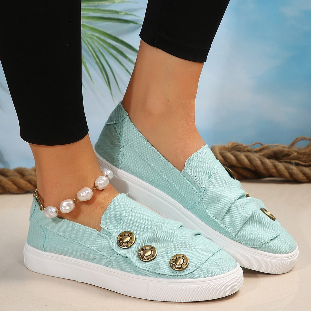 Damen Slip-On Sneakers mit modischen Knopfdetails EB