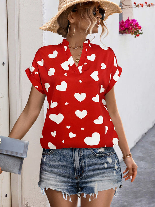 Damen luftiges Blusenshirt mit herzförmigem Print und lockerer Passform EB