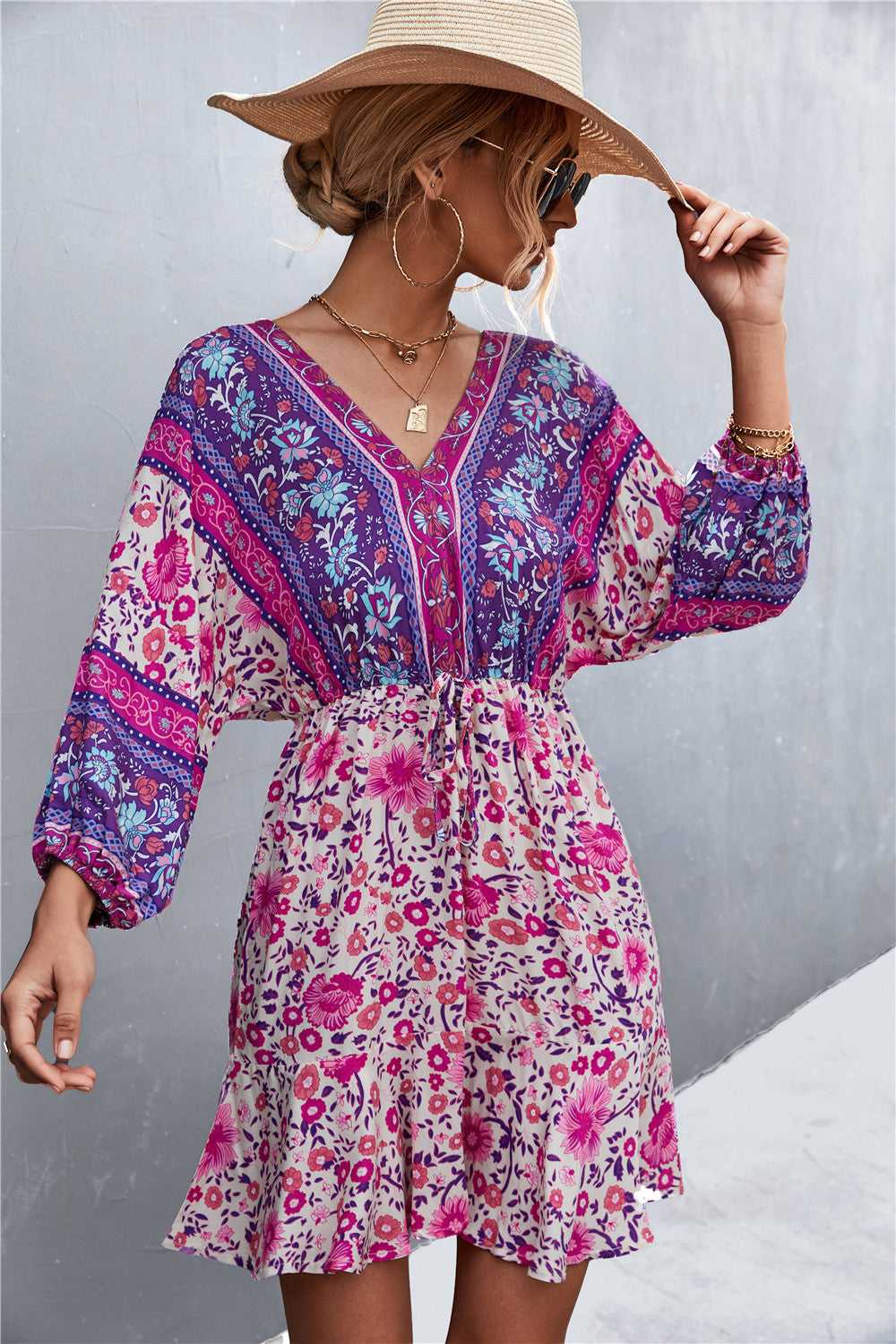 Damen Sommerliches Blusenkleid mit auffälligem floralen Muster und eleganten Puffärmeln EB
