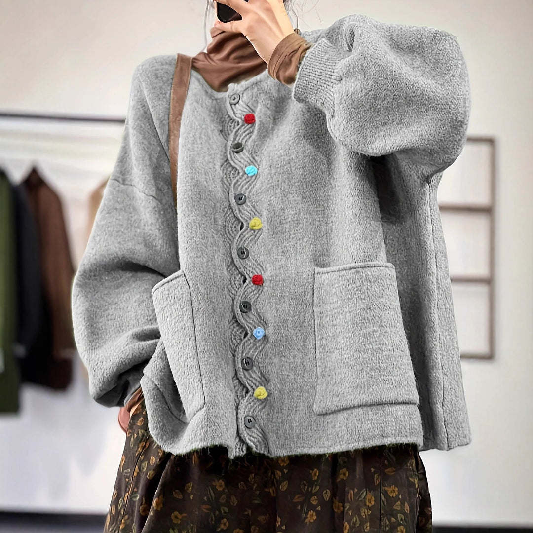 Damen Oversized Strickcardigan mit Zierknopfleiste und aufgesetzten Taschen EB