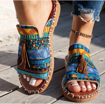 Damen Ethno-Slipper-Sandalen mit Quaste und handgenähter Ziernaht EB