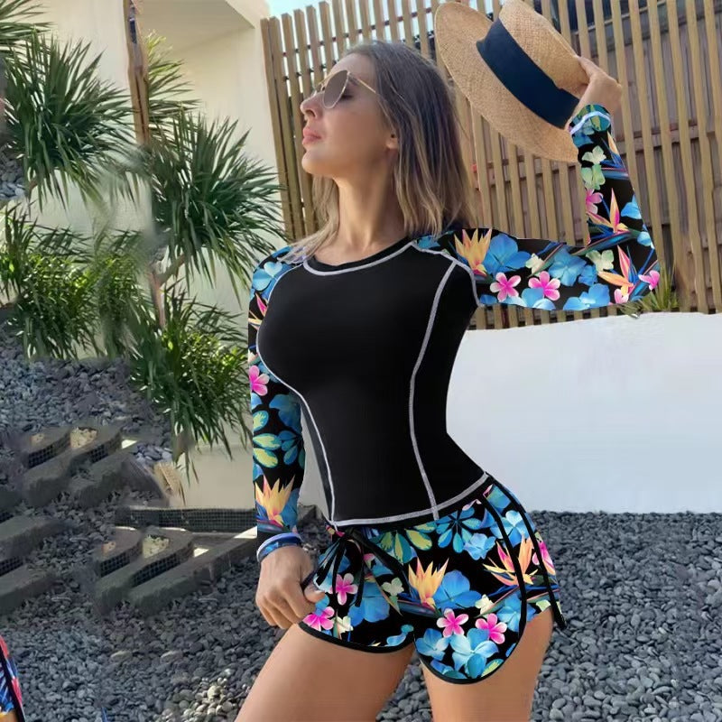 Damen Sportlicher Langarm-Schwimmanzug mit floralem Design und Shorts EB