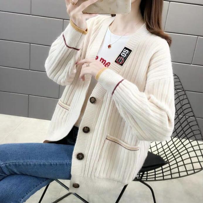 Damen Strickjacke mit strukturiertem Rippmuster und praktischen Taschen EB
