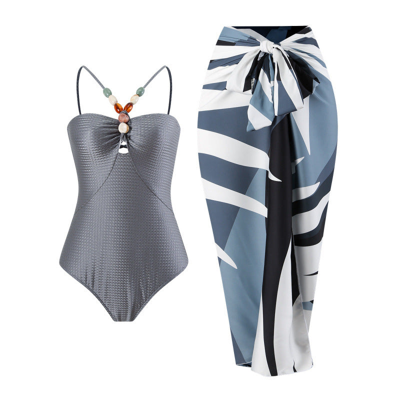 Damen Bandeau-Badeanzug mit asymmetrischem Rock EB