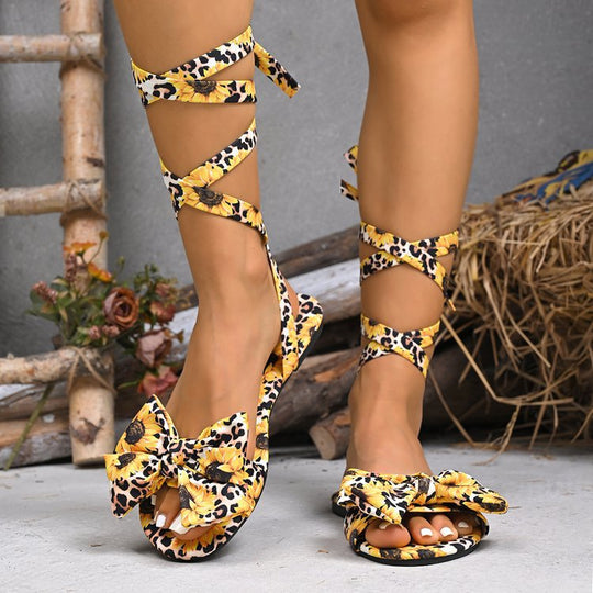 Damen Riemchen-Sandalen mit floralem Muster und dekorativem Knoten EB