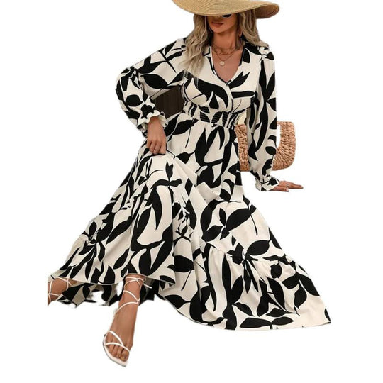 Damen Maxikleid mit floralem Muster und voluminösem Saum EB