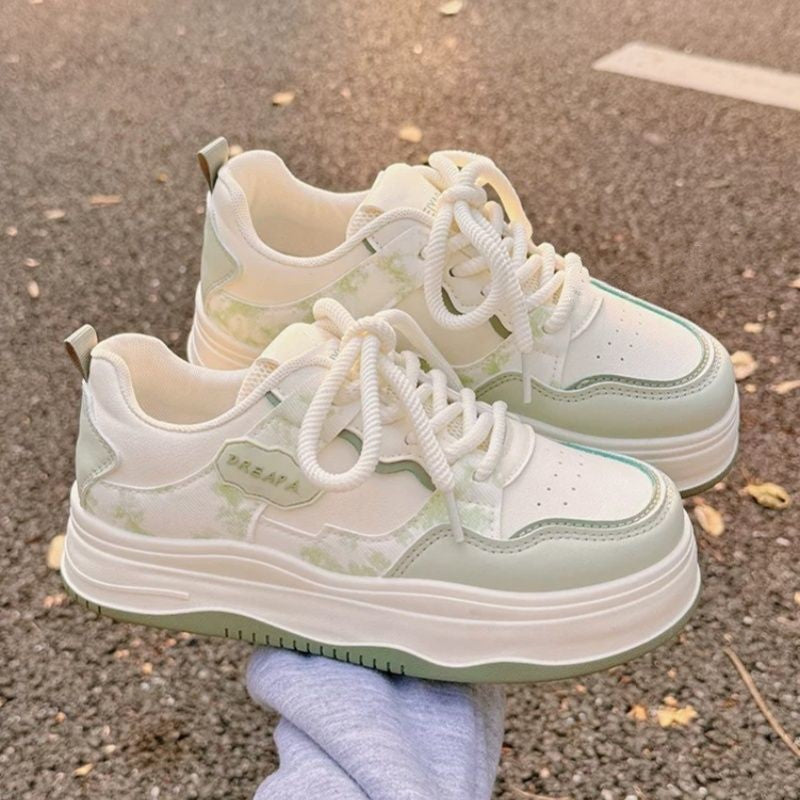 Damen Voluminöser Plateau‑Sneaker im Retro‑Citystil mit dezenter Marmorierung und dämpfender Keilsohle EB