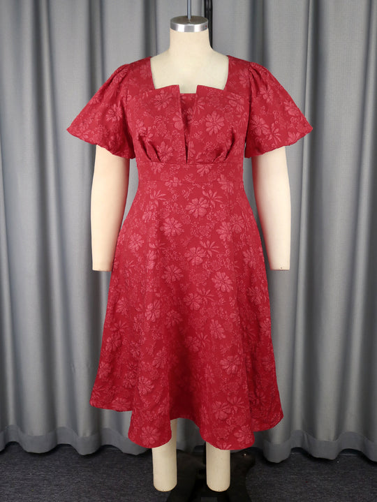 Damen Midikleid mit schwingendem Rock und floralen Mustern EB