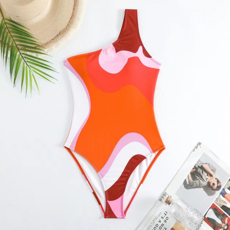 Damen Einteiler Badeanzug mit modischem Muster und passendem Sarong EB