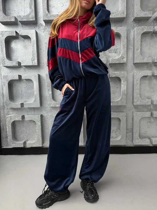 Damen Retro-inspiriertes Samt-Trackset mit Chevron-Design, Stehkragen und weiter High-Waist-Jogger Eichborn Berlin